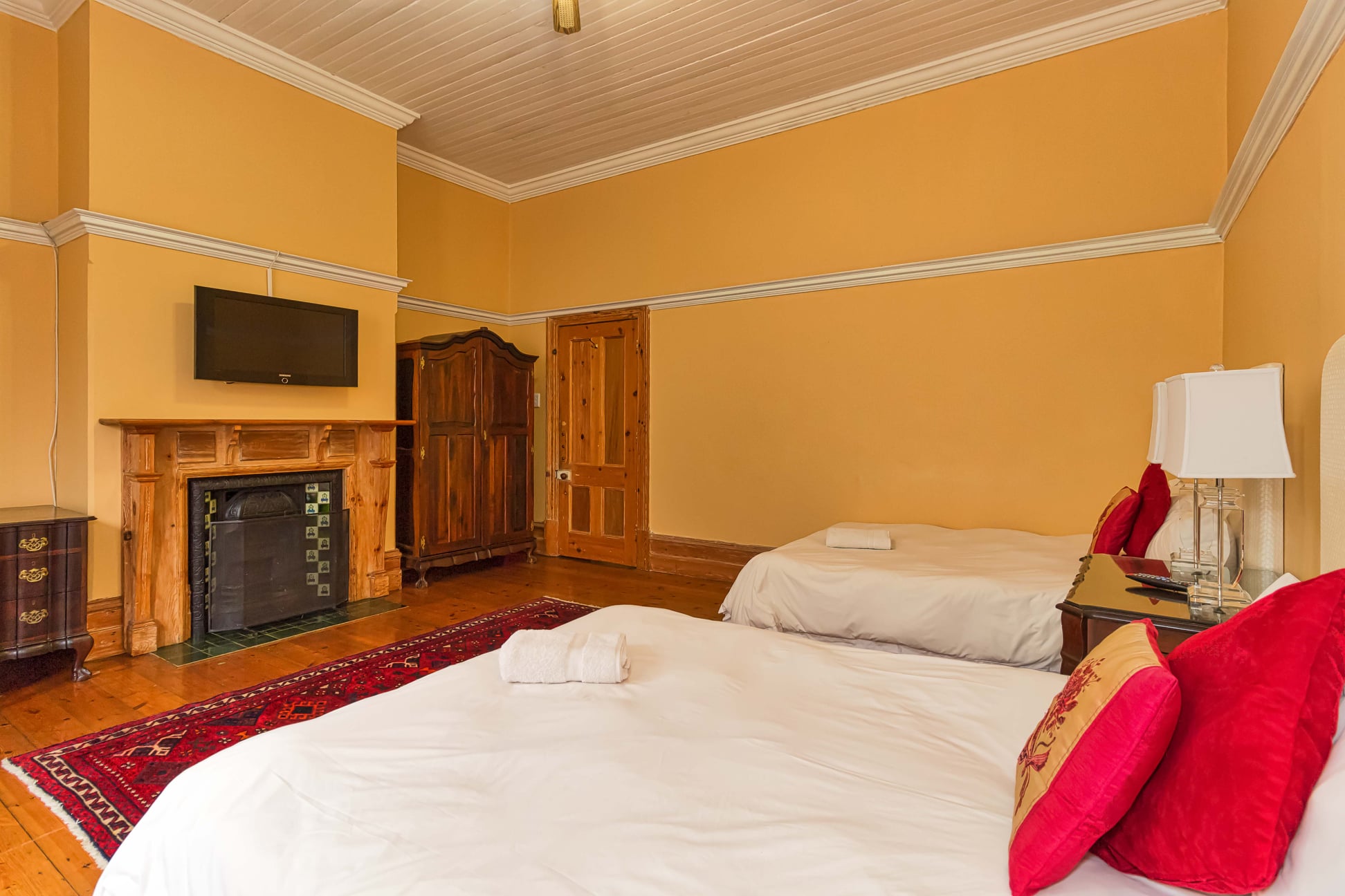Summer Breeze Family Suite with original Victorian fireplace and Stinkwood furniture